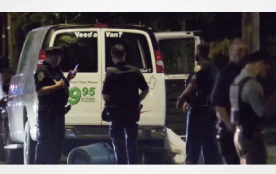 Man, 43, shot dead, left hanging out of U-Haul van that cops find packed with marijuana