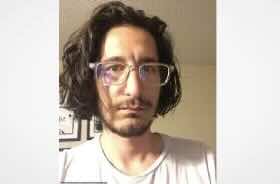 California professor arrested, accused of throwing tear gas canister at feds during Glass House raid