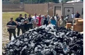 USA: Truck driver calls 911 on own load after load shift reveals packages of cannabis